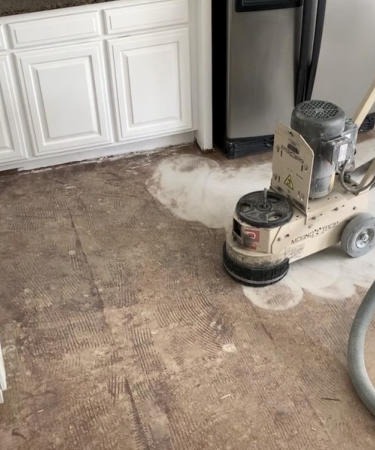 This is the removal of decorative concrete overlay that had gone bad that had to be removed so new flooring could be installed.