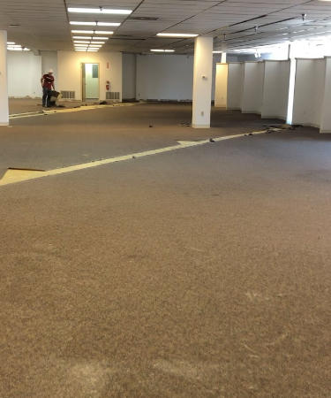 This is a commercial space that had glue down carpet that was worn and need to be replaced in Springdale AR.