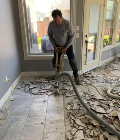 This is a tile floor removal, grinding of the remaining thin-set to get it back to a smooth surface so new tile can be installed in the rogers AR area.