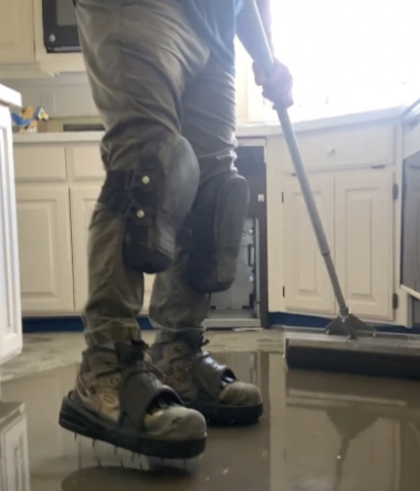 This is a picture of floating a new concrete floor in Bella Vista AR. Once done we will install hardwood floor over the new smooth surface.